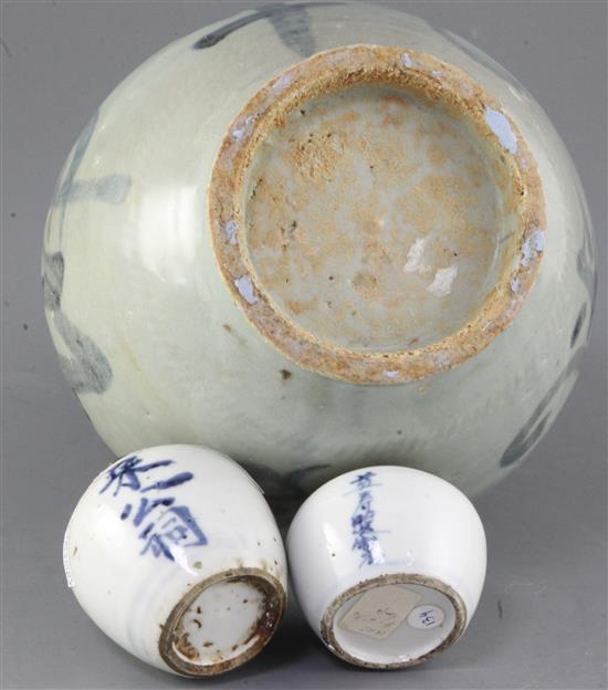 A Chinese blue and white calligraphic jar and cover, and two similar smaller jarlets